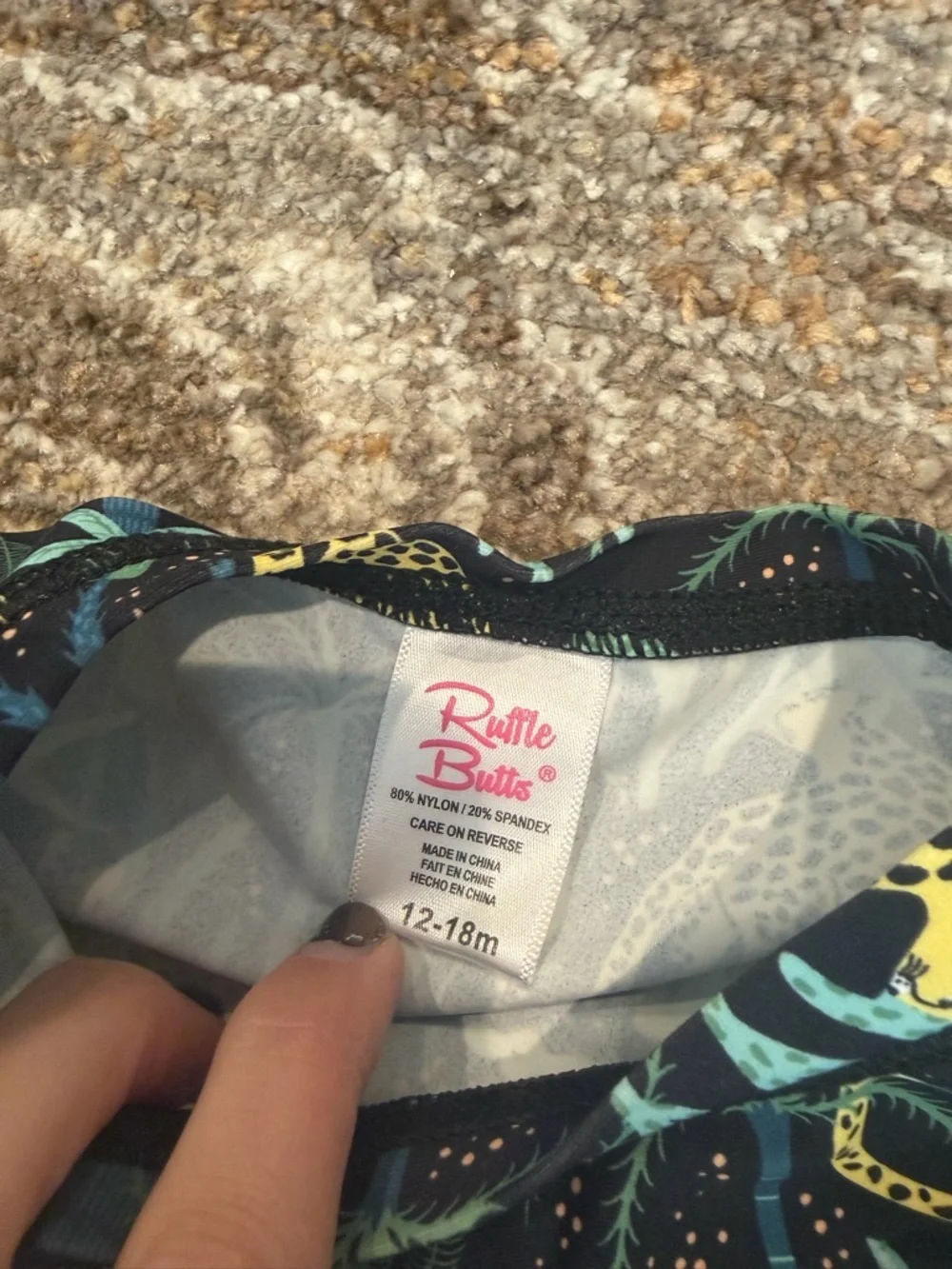 Ruffle Butts Navy Swim Top with Yellow cheetahs and Teal Leaves